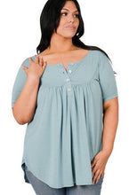 Load image into Gallery viewer, Our Creative Minds Short Sleeve Top is the ideal combination of classic meets quality. We are positive this will become one of your new closet favorites with its shirt tail hem and shell button detail!