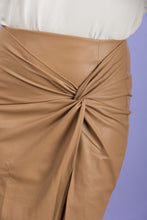 Load image into Gallery viewer, Dressed to impress, is an understatement when you wear our Business First Faux Leather Mini Skirt! This skirt is perfect to pair with any top!