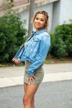 Load image into Gallery viewer, Our Caught in Motion Ribbed Tank Dress is the Perfect dress for a day running errands! We decided to pair this dress with a denim jacket, white sneakers and some gold accessories for a casual day look. The fabric is so soft, and the length is just right! With its adjustable tied straps and stretchy fabric, this dress will be perfect for any body type!