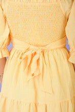 Load image into Gallery viewer, Don't Miss out on the ideal Spring dress! This is the dress that every girl dreams of with is Gingham Pattern, tie detail, Smocked Back Panel, and Pockets!