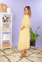 Load image into Gallery viewer, Don't Miss out on the ideal Spring dress! This is the dress that every girl dreams of with is Gingham Pattern, tie detail, Smocked Back Panel, and Pockets!