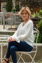 Load image into Gallery viewer, A perfect classic blouse with a southern twist. This top is one you can transition into any season and alway look put together. We like to style this top with some dark wash denim gold jewerly and a pair black heels for a day in the office. Add some more southern charm with a pair of black bootcut jeans and a black hat and you will be ready for your local country concert!