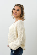 Load image into Gallery viewer, This open knit button down off-white sweater is so unique and perfect for any ocassion! Wear it like our model Melody as a top, or unbutton the sweater and use it as a layering piece to keep you warm this winter. The styling options are truly endless!