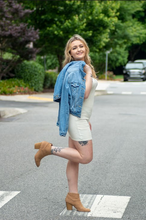 Load image into Gallery viewer, Our Caught in Motion Ribbed Tank Dress is the Perfect dress for a day running errands! We decided to pair this dress with a denim jacket, white sneakers and some gold accessories for a casual day look. The fabric is so soft, and the length is just right! With its adjustable tied straps and stretchy fabric, this dress will be perfect for any body type!