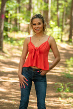 Load image into Gallery viewer, Wear this with a pair of denim and your have the perfect patriotic outfit! With its adjustable front tie detail, smock back panel, and adjustable straps; this top is perfect for any body type!