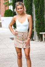 Load image into Gallery viewer, You don't wanna miss out on this Subtle Sophistication Striped Button Down Mini Skirt! Its the perfect neutral skirt to transition into every season. Pair this skirt with a white crop top and pair of white sneakers for the warmer weather, or add some tan Thigh high boots with a a white long sleeve bodysuit.