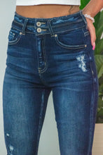 Load image into Gallery viewer, The 'Bare Necessities' High Rise pair of jeans should be a staple in every girls' closet this season. With Bootcut "flare" pants coming back, this is the perfect pair! The dark wash is slimming and the high rise is perfect for every girl. You won't wanna miss out on these!