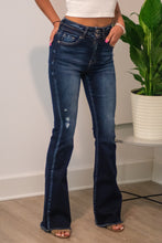 Load image into Gallery viewer, The 'Bare Necessities' High Rise pair of jeans should be a staple in every girls' closet this season. With Bootcut "flare" pants coming back, this is the perfect pair! The dark wash is slimming and the high rise is perfect for every girl. You won't wanna miss out on these!