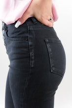 Load image into Gallery viewer, The Trouble Maker Kan Cans are the Perfect Pair of Black denim every girl's closet needs! With its flattering high rise cut, and flare leg you are sure to look stunning wherever you go!