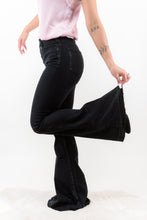 Load image into Gallery viewer, The Trouble Maker Kan Cans are the Perfect Pair of Black denim every girl's closet needs! With its flattering high rise cut, and flare leg you are sure to look stunning wherever you go!