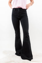 Load image into Gallery viewer, The Trouble Maker Kan Cans are the Perfect Pair of Black denim every girl's closet needs! With its flattering high rise cut, and flare leg you are sure to look stunning wherever you go!