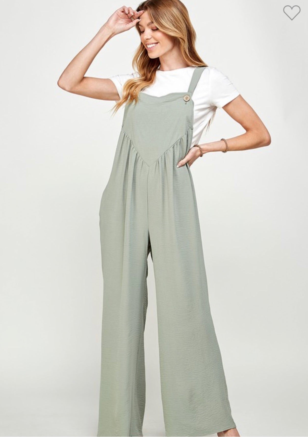 This is the statement piece you have been waiting for! Perfect for traveling, parks with the kids, gardening, and so much more! We can't say enough amazing things about our Sweet Life Wide Leg Overall Jumpsuit! Its linen fabric is lightweight and will keep you cool during the hot sunny days, and the the wide pant legs and deep pockets not only make you stylish but functional! You won't want to miss out on our Sweet Life Square Neck Wide Leg Linen Jumpsuit!