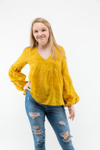 Load image into Gallery viewer, The Crochet Cut Out Mustard colored blouse will add the perfect pop of color to your Spring/Summer wardrobe! We think this top with some cutoff denim shorts and white booties will make the perfect casual girl outfit!
