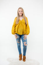 Load image into Gallery viewer, The Crochet Cut Out Mustard colored blouse will add the perfect pop of color to your Spring/Summer wardrobe! We think this top with some cutoff denim shorts and white booties will make the perfect casual girl outfit!
