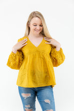 Load image into Gallery viewer, The Crochet Cut Out Mustard colored blouse will add the perfect pop of color to your Spring/Summer wardrobe! We think this top with some cutoff denim shorts and white booties will make the perfect casual girl outfit!
