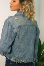 Load image into Gallery viewer, You will fall head over heels for our &#39;Daring Desires&#39; distressed denim jacket! Complete any fall look with our oversized jacket that is sure to keep you warm and stylish! You won&#39;t want to miss out on this closet staple piece! 
