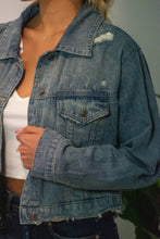 Load image into Gallery viewer, You will fall head over heels for our &#39;Daring Desires&#39; distressed denim jacket! Complete any fall look with our oversized jacket that is sure to keep you warm and stylish! You won&#39;t want to miss out on this closet staple piece! 
