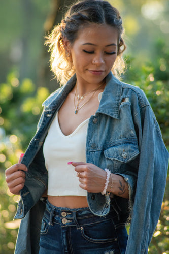 You will fall head over heels for our 'Daring Desires' distressed denim jacket! Complete any fall look with our oversized jacket that is sure to keep you warm and stylish! You won't want to miss out on this closet staple piece! 