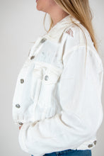 Load image into Gallery viewer, You will fall head over heels for our &#39;Daring Desires&#39; distressed denim jacket! Complete any look with our oversized jacket that is sure to keep you warm and stylish! You won&#39;t want to miss out on this closet staple piece! 
