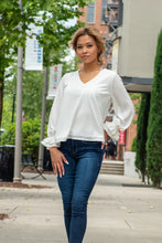 Load image into Gallery viewer, A perfect classic blouse with a southern twist. This top is one you can transition into any season and alway look put together. We like to style this top with some dark wash denim gold jewerly and a pair black heels for a day in the office. Add some more southern charm with a pair of black bootcut jeans and a black hat and you will be ready for your local country concert!
