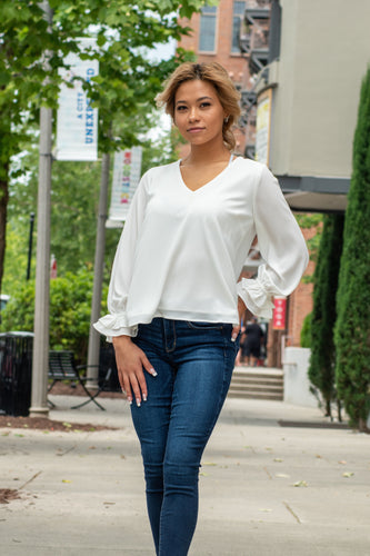 A perfect classic blouse with a southern twist. This top is one you can transition into any season and alway look put together. We like to style this top with some dark wash denim gold jewerly and a pair black heels for a day in the office. Add some more southern charm with a pair of black bootcut jeans and a black hat and you will be ready for your local country concert!