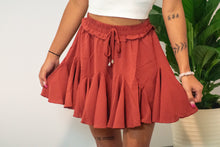 Load image into Gallery viewer, The perfect skort to transition into fall. With its cozy color and flirty ruffles, you can dress this piece up or down. We think the dainty details of our &#39;Pure Conifdence&#39; bodysuit compliments the skort perfectly; just add some sneakers and you are ready!

