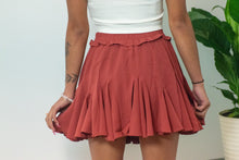Load image into Gallery viewer, The perfect skort to transition into fall. With its cozy color and flirty ruffles, you can dress this piece up or down. We think the dainty details of our &#39;Pure Conifdence&#39; bodysuit compliments the skort perfectly; just add some sneakers and you are ready!
