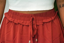 Load image into Gallery viewer, The perfect skort to transition into fall. With its cozy color and flirty ruffles, you can dress this piece up or down. We think the dainty details of our &#39;Pure Conifdence&#39; bodysuit compliments the skort perfectly; just add some sneakers and you are ready!
