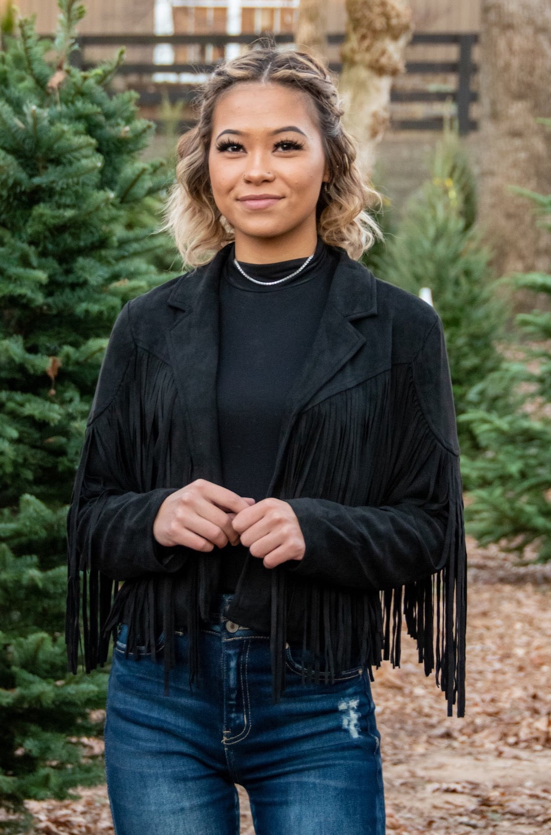 Looking for Boho or Western style this Jacket has you Covered! Dress it up with a mini dress and some heels or pair it with a bright red top and some black denim; either way you are sure to have heads turning in our 'Fringe Fanatic' Jacket!