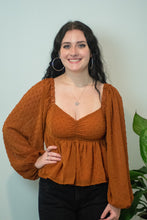 Load image into Gallery viewer, You don&#39;t want to miss out on the perfect top for the holidays! This top is sure to be a staple for the fall season and the textured swiss dots add a little extra spice! For a casual look, pair our Pure Memory top with some black denim, black botties, boho hat and you will be sure to get all of the compliments!
