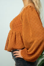 Load image into Gallery viewer, You don&#39;t want to miss out on the perfect top for the holidays! This top is sure to be a staple for the fall season and the textured swiss dots add a little extra spice! For a casual look, pair our Pure Memory top with some black denim, black botties, boho hat and you will be sure to get all of the compliments!
