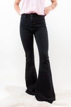 Load image into Gallery viewer, The Trouble Maker Kan Cans are the Perfect Pair of Black denim every girl&#39;s closet needs! With its flattering high rise cut, and flare leg you are sure to look stunning wherever you go! 
