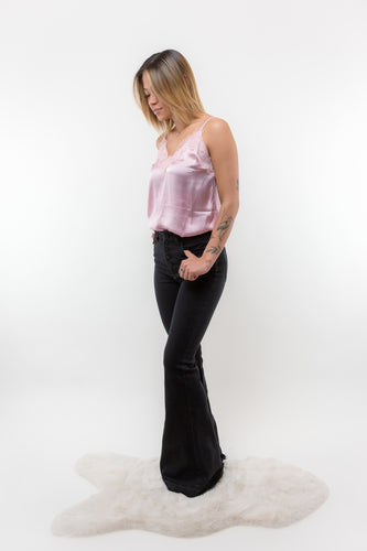 The Trouble Maker Kan Cans are the Perfect Pair of Black denim every girl's closet needs! With its flattering high rise cut, and flare leg you are sure to look stunning wherever you go! 
