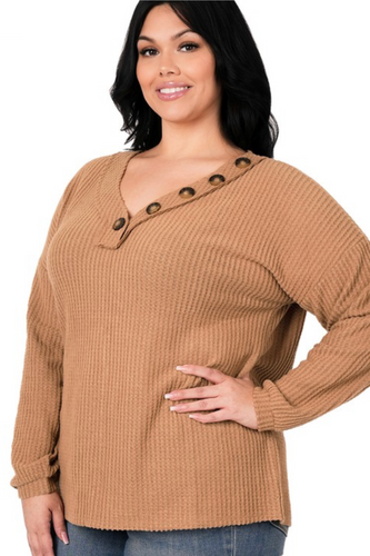 Our Half of My Heart Sweater Top is the perfect light weight sweater to have for any transitional season. The neutral color, makes this top easy to style with anything. The options are truly endless with our Half of My Heart Long Sleeve Waffle Knit Sweater Top!