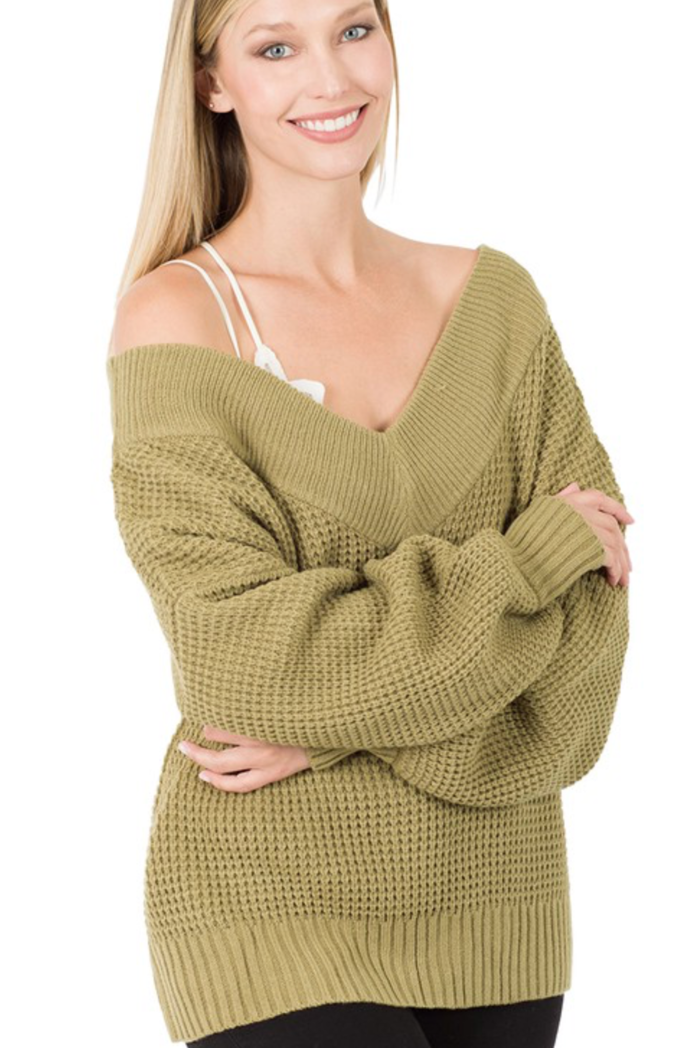 Our Love and Adored Sweater is the perfect casual top for every day wear. It features a deep V-neckline for off the shoulder wear, and a chunky knit material to keep you warm all winter long!
