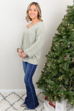 Load image into Gallery viewer, Our Love and Adored Sweater is the perfect casual top for every day wear. It features a deep V-neckline for off the shoulder wear, and a chunky knit material to keep you warm all winter long!
